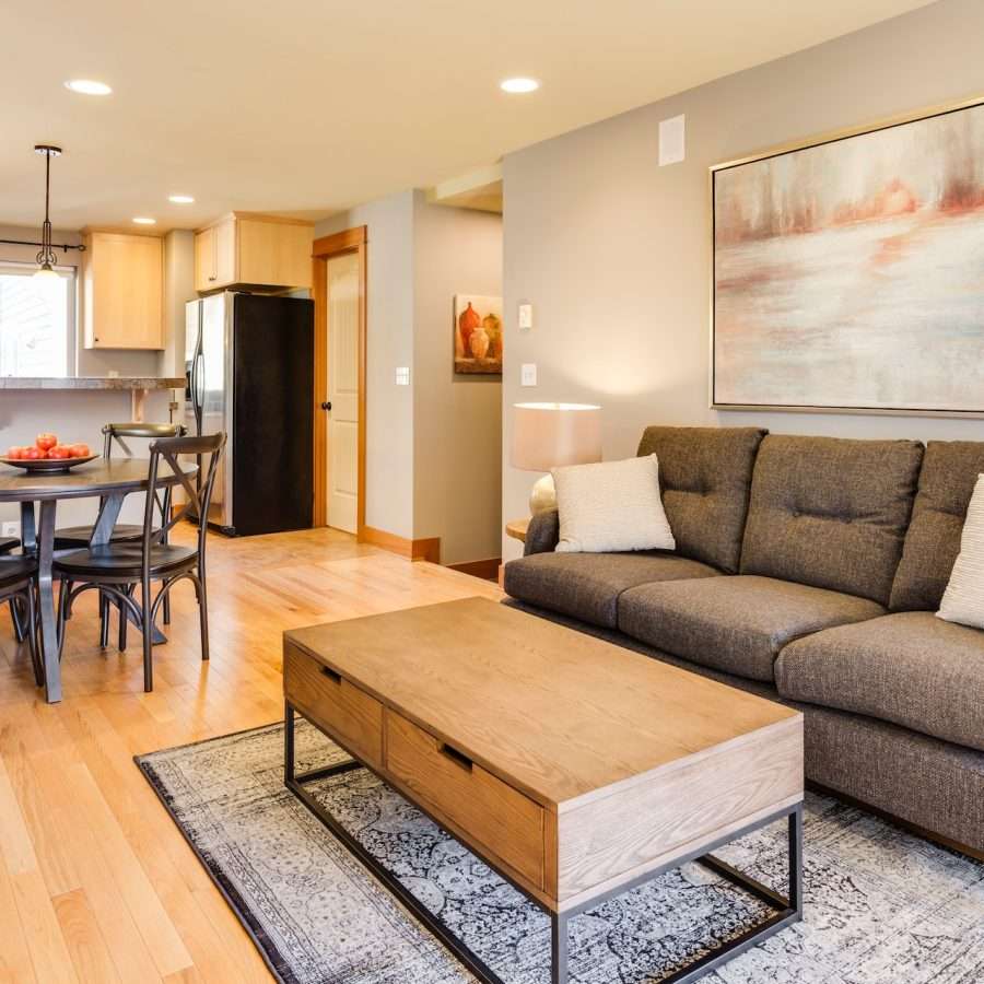 rectangular coffee table beside a 3-seat sofa