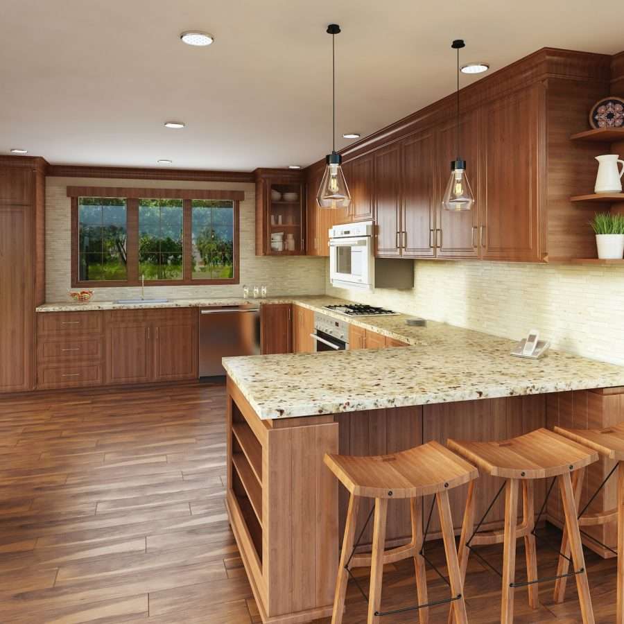 brown wooden table beside and chairs beside a granite wor