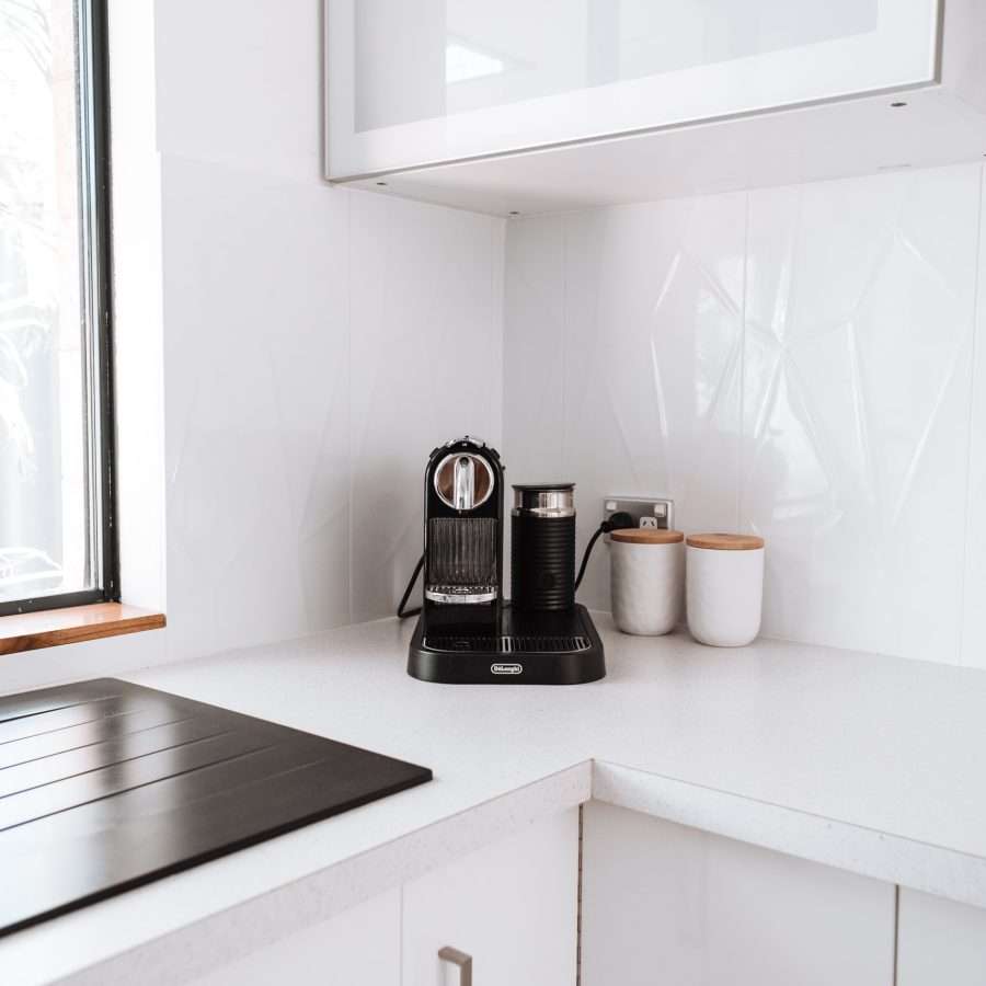  Coffee machine on the white kitchen counter